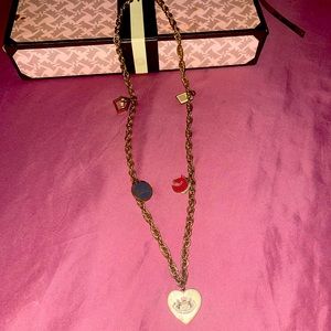 Juicy Couture Charm Necklace sold AS IS with multiple charms around